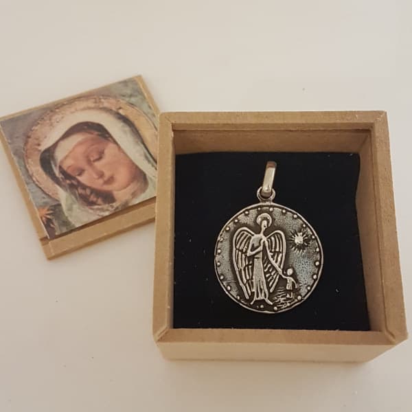 Medalla Ángel de la Guarda con sol en plata 900