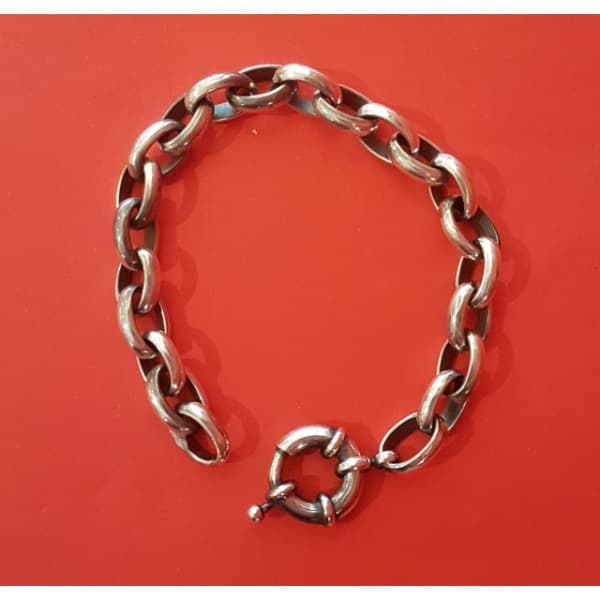 Pulsera media caña número 1 en Plata Mater con timón